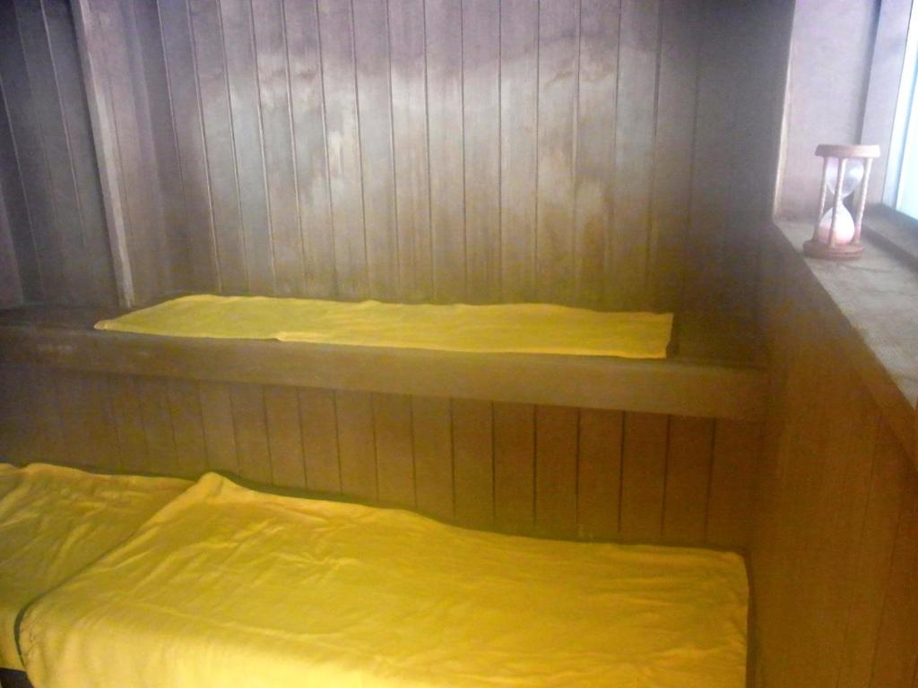 Postel nebo postele na pokoji v ubytování Akakura Hotel