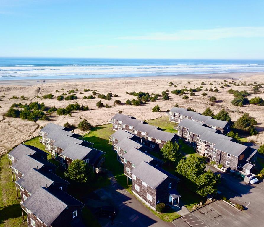 an aerial view of a resort on the beach at Lighthouse Oceanfront Resort in Long Beach