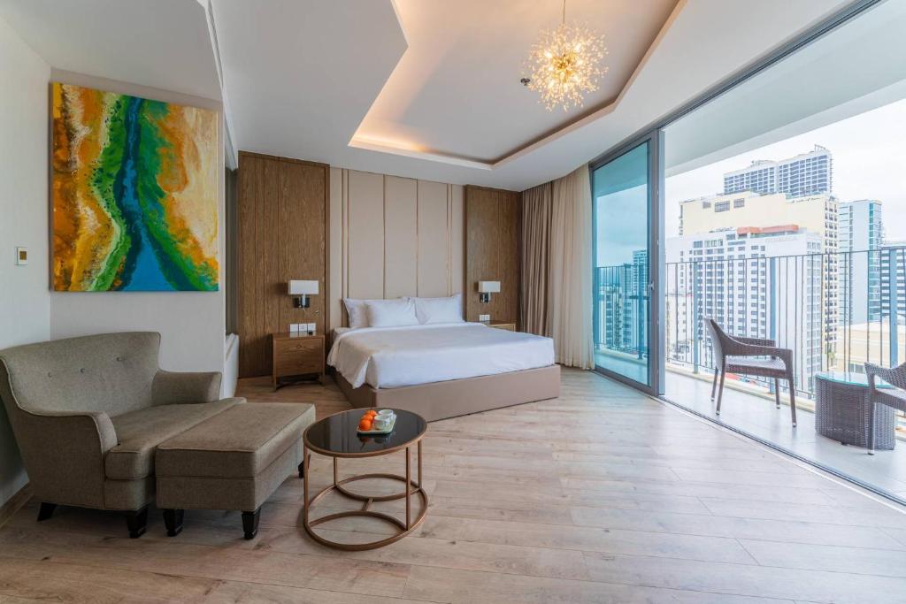 Giường trong phòng chung tại Moonlight Bay Panorama Condotel Ocean View