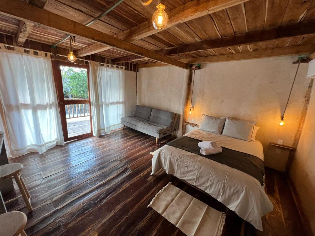 Postel nebo postele na pokoji v ubytování Xa am Natural Lodgement