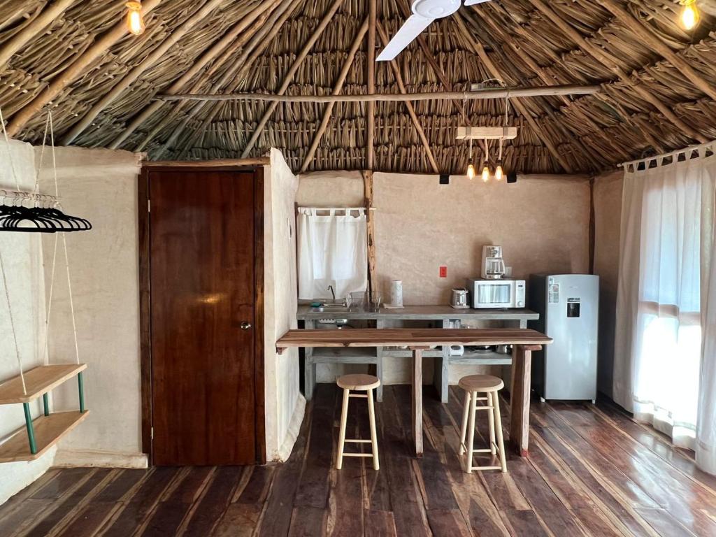 Kuchyň nebo kuchyňský kout v ubytování Xa am Natural Lodgement