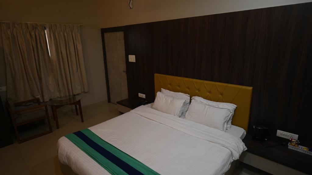 Postel nebo postele na pokoji v ubytování Hotel Green Apple