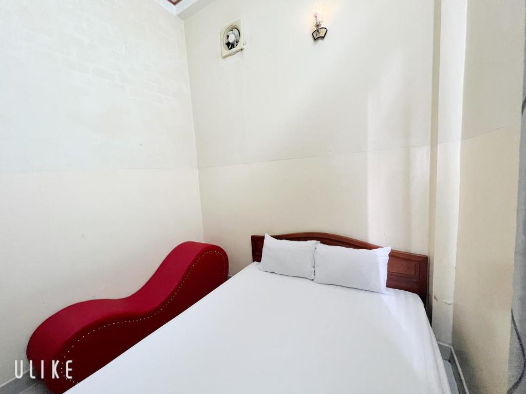 Postel nebo postele na pokoji v ubytování Thanh Tâm Hotel