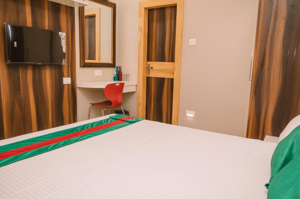 Postel nebo postele na pokoji v ubytování Hotel Green Apple