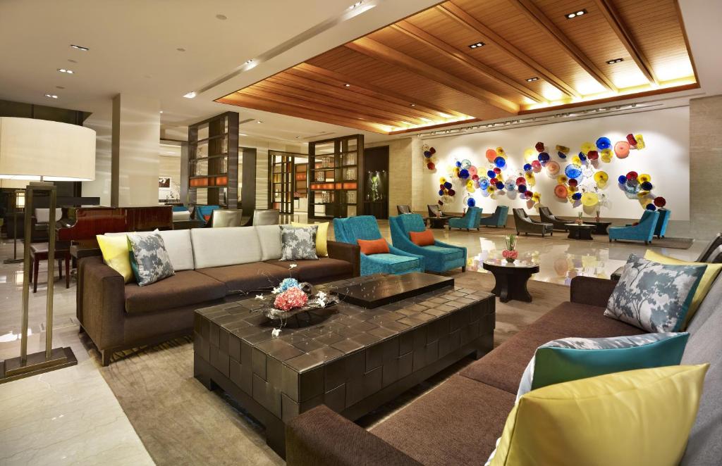 Posezení v ubytování Taj Surajkund Resort & Spa, Delhi NCR