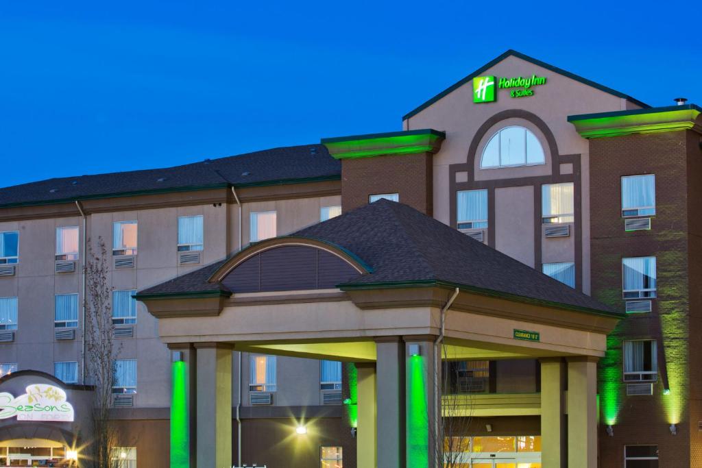 a rendering of the front of a hotel at Holiday Inn & Suites Grande Prairie, an IHG Hotel in Grande Prairie