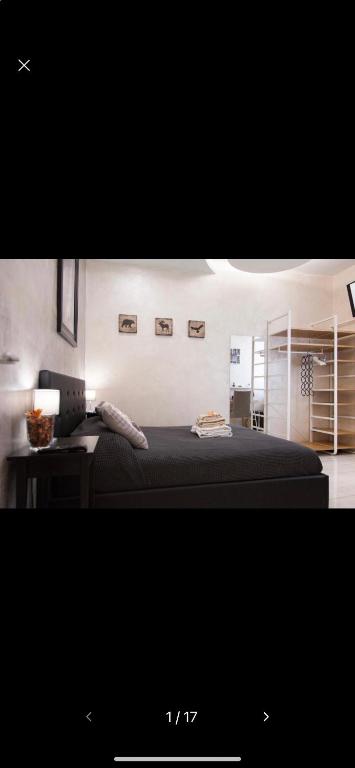 A bed or beds in a room at Gold House