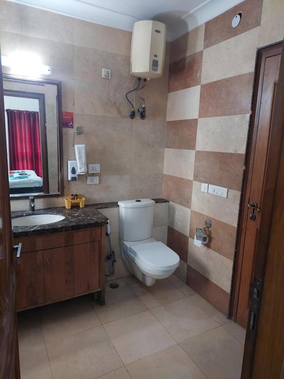 Koupelna v ubytování Hotel Ashray Noida
