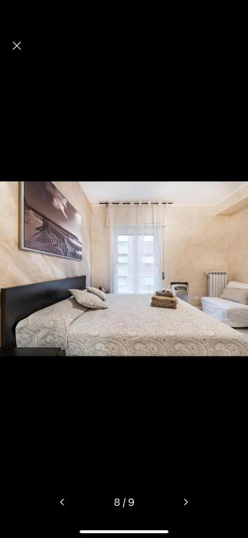 A bed or beds in a room at Gold House