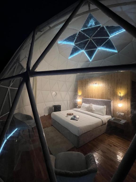 Postel nebo postele na pokoji v ubytování GLAMPING CLUB