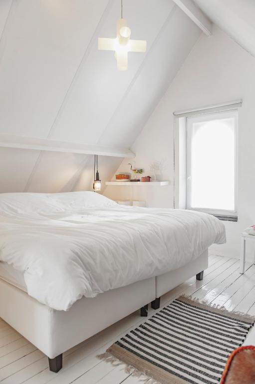 Postel nebo postele na pokoji v ubytování Vakantiehuis Juliette