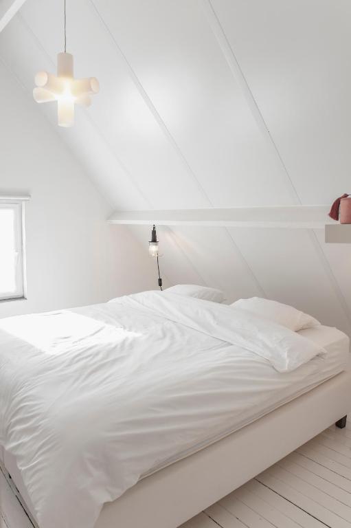 Postel nebo postele na pokoji v ubytování Vakantiehuis Juliette