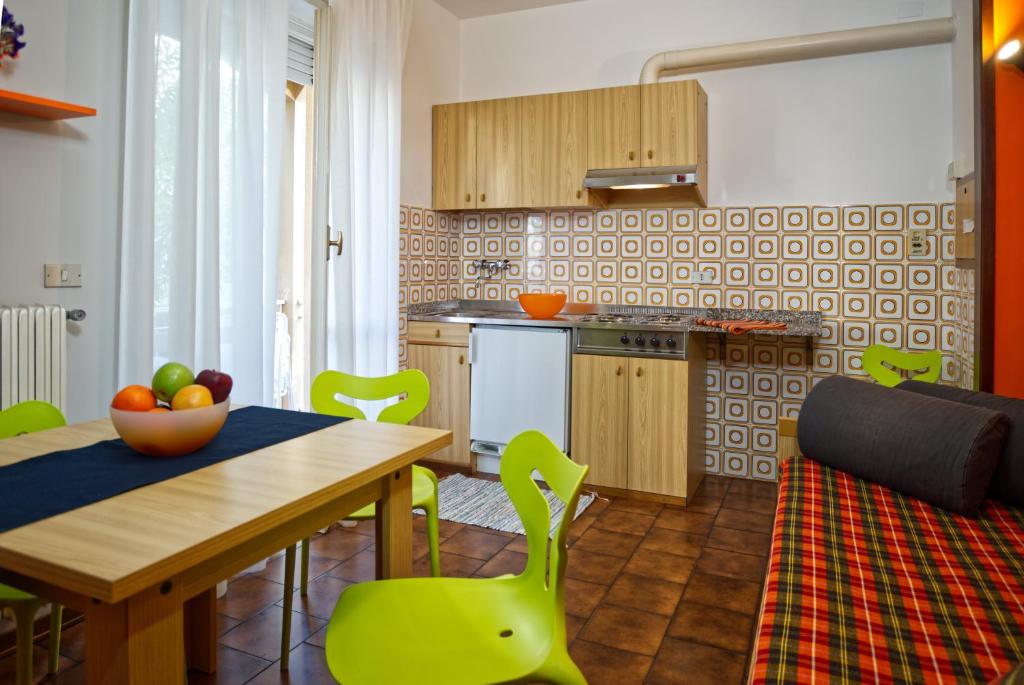 Kuchyň nebo kuchyňský kout v ubytování Residence Orchidea