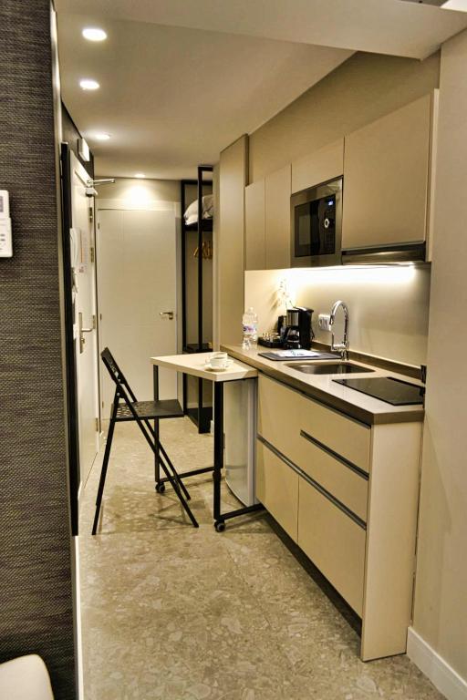 Kuchyň nebo kuchyňský kout v ubytování GBH Hotel-Apartamentos Posidonia