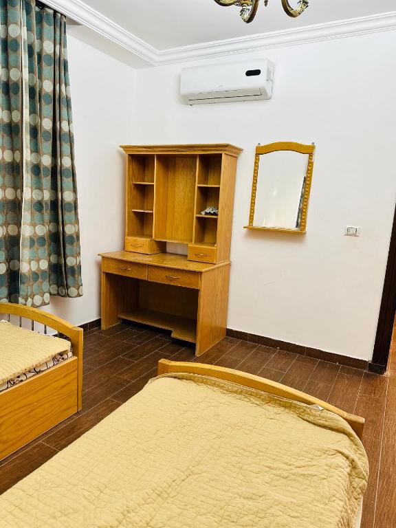 Postel nebo postele na pokoji v ubytování شقق الياسمين 2