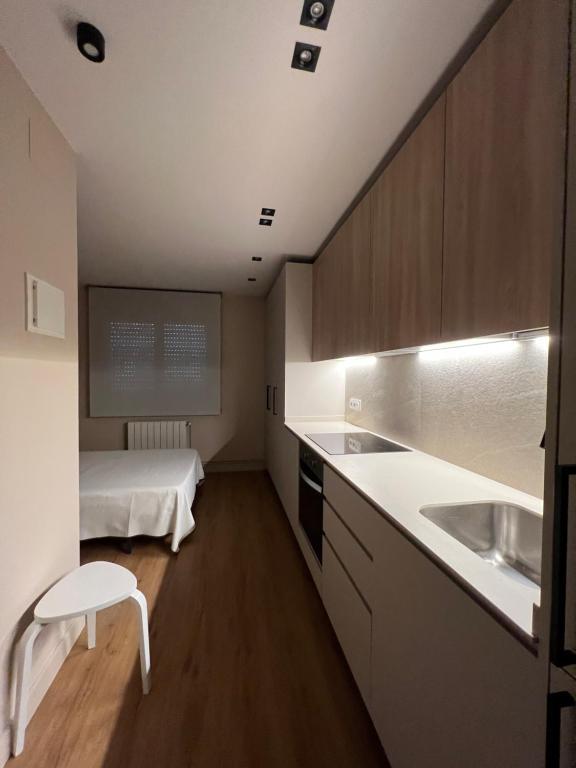 Kuchyň nebo kuchyňský kout v ubytování Hostal Crisami