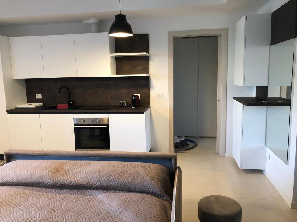 Kuchyň nebo kuchyňský kout v ubytování Loft with terrace in Uptown Milan near Rho Fiera