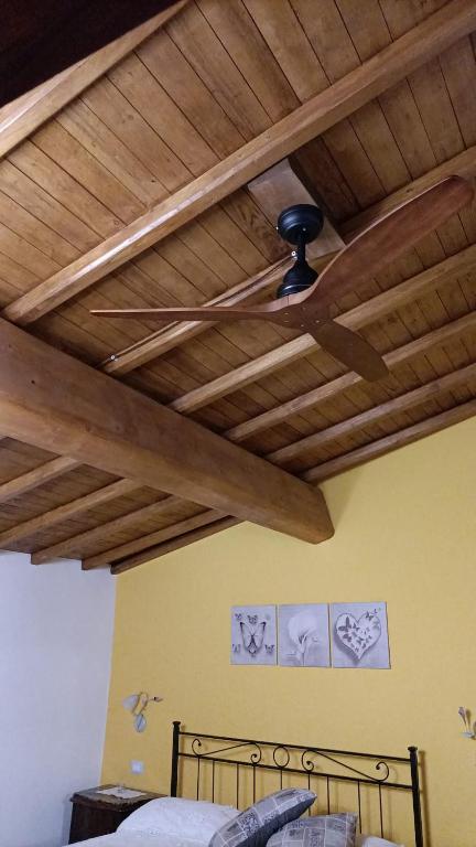 Letto o letti in una camera di B&B Il Grifo