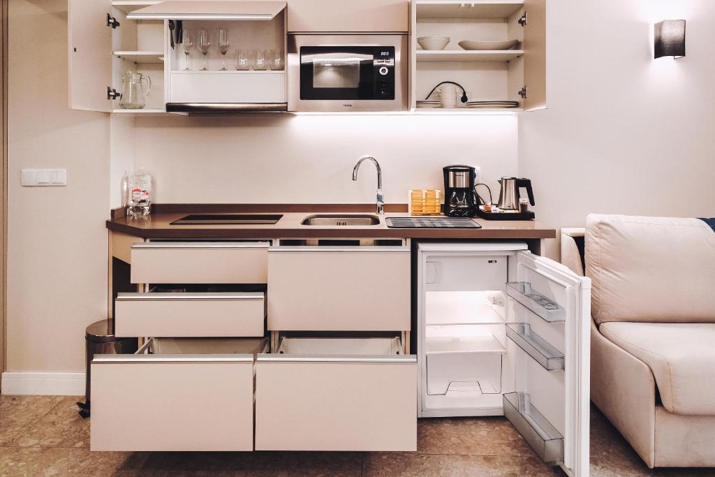Kuchyň nebo kuchyňský kout v ubytování GBH Hotel-Apartamentos Posidonia