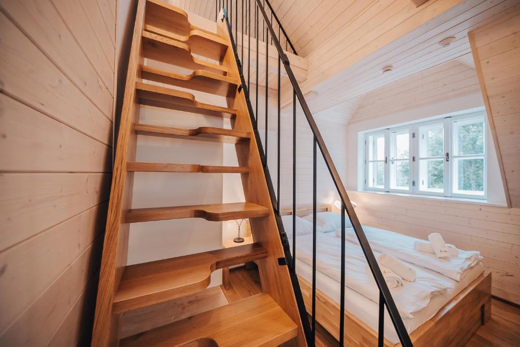 Postel nebo postele na pokoji v ubytování Apartman s výhledem