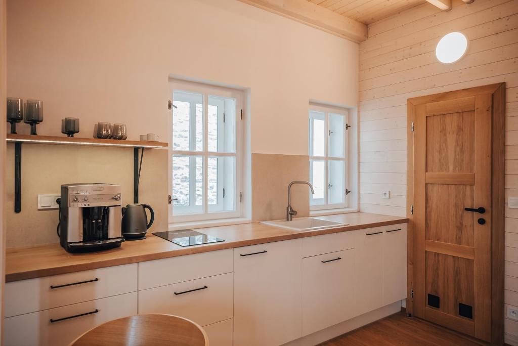Kuchyň nebo kuchyňský kout v ubytování Apartman s výhledem