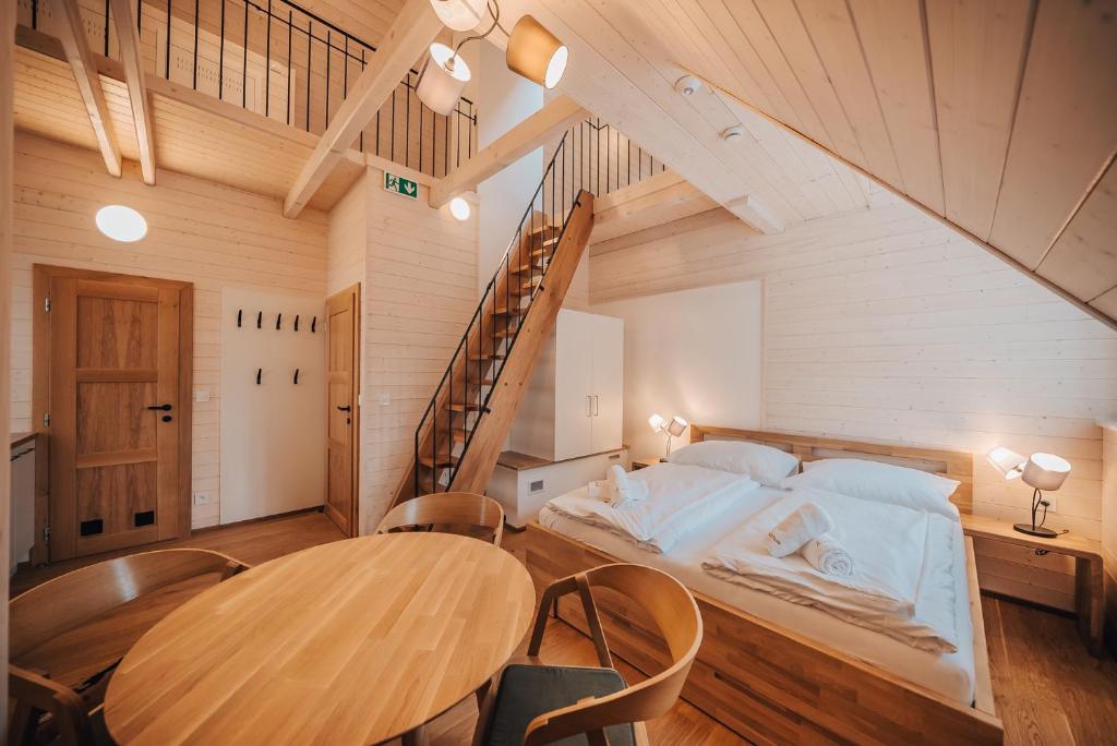 Postel nebo postele na pokoji v ubytování Apartman s výhledem
