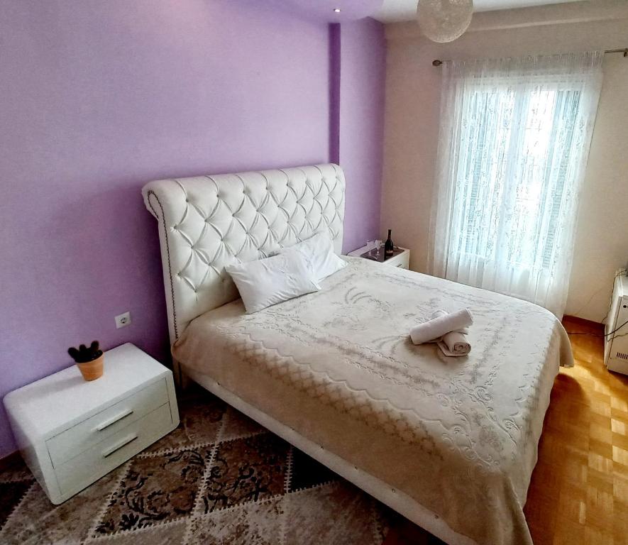 Postel nebo postele na pokoji v ubytování MS Corfu Center Apartment