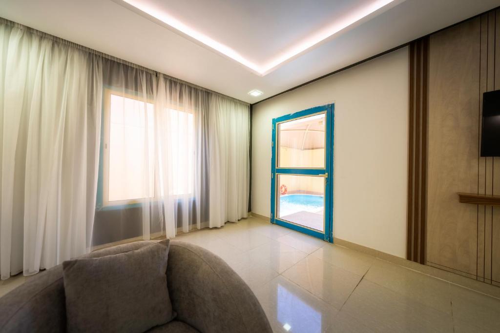 TV a/nebo společenská místnost v ubytování Mirada Gold Jizan - Resort & Private Pools