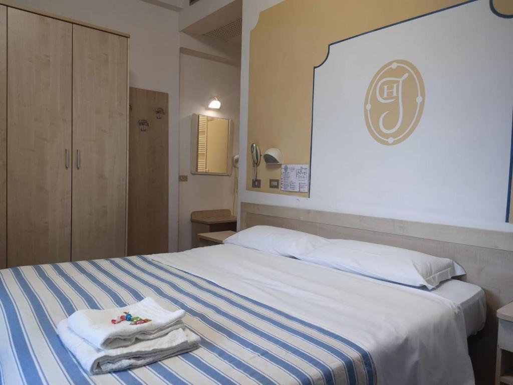 Postel nebo postele na pokoji v ubytování Hotel Jolie