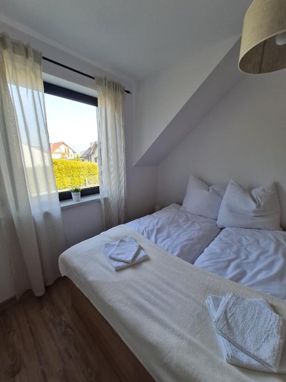 Posteľ alebo postele v izbe v ubytovaní Apartamenty Josef
