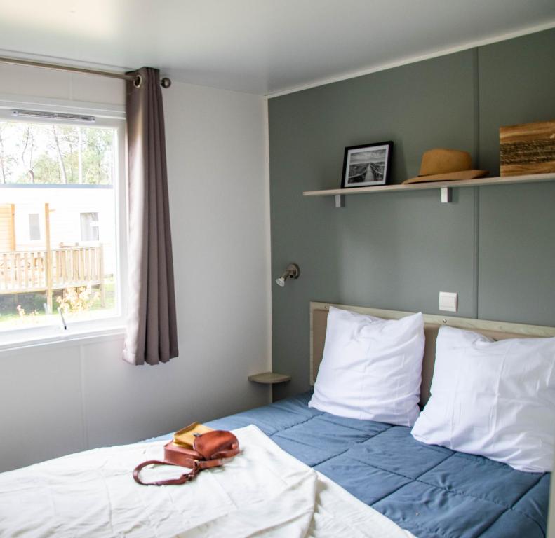 Postel nebo postele na pokoji v ubytování Camping Saint Laurent