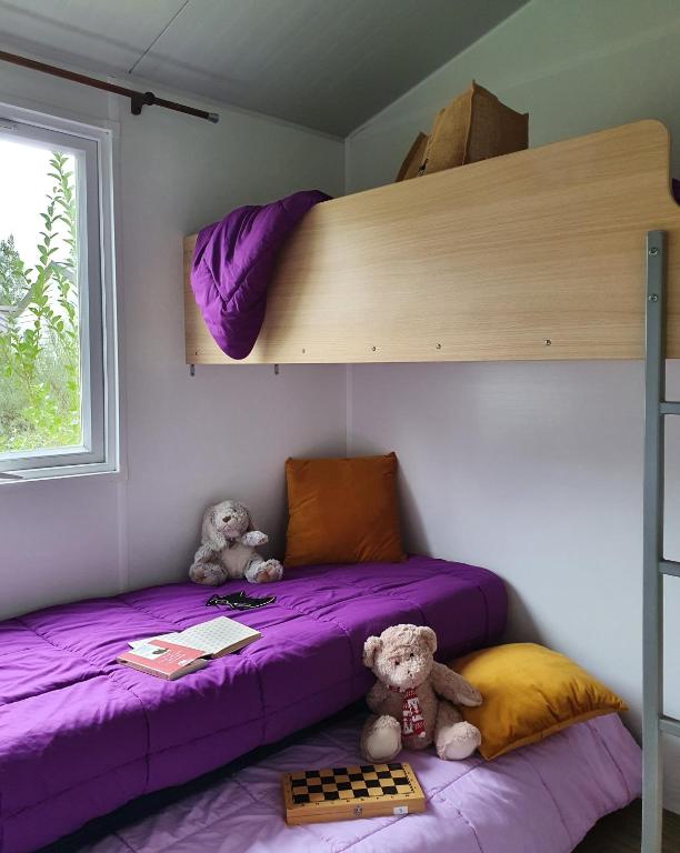 Postel nebo postele na pokoji v ubytování Camping Saint Laurent