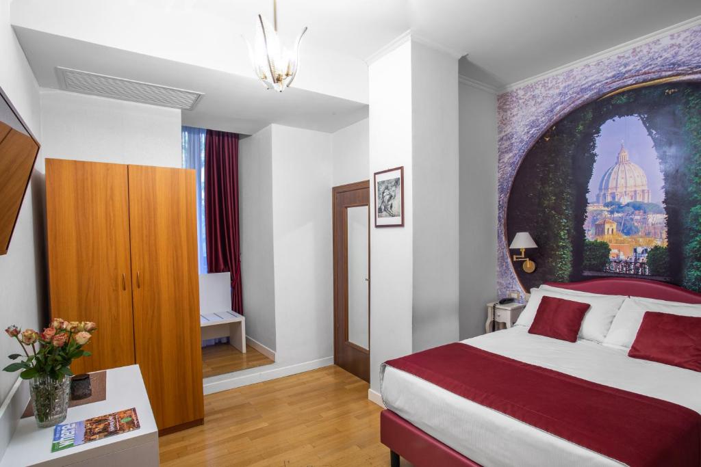 Postel nebo postele na pokoji v ubytování Hotel Piazza Di Spagna