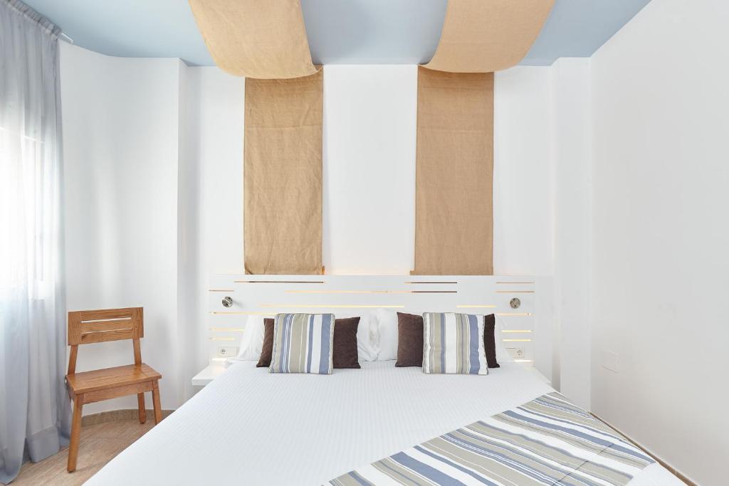 Postel nebo postele na pokoji v ubytování Apartamentos Castaví