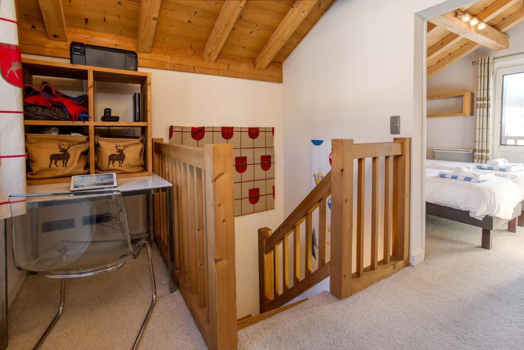 Posteľ alebo postele v izbe v ubytovaní Chalet le Tremplin