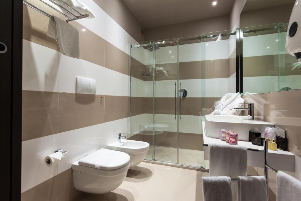 Koupelna v ubytování Hotel Vittoria