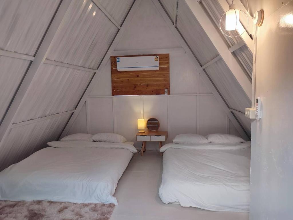 Llit o llits en una habitació de Foreste’ Camp