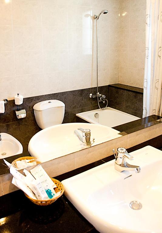 Koupelna v ubytování Hotel Arumí
