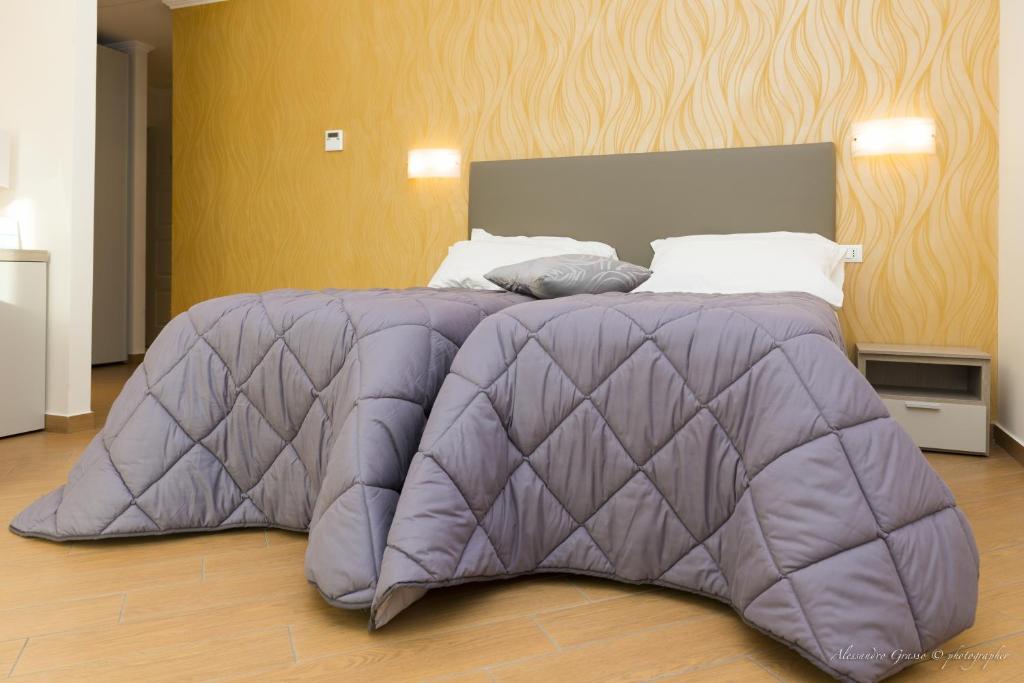 Cama o camas de una habitación en Porto Di Claudio