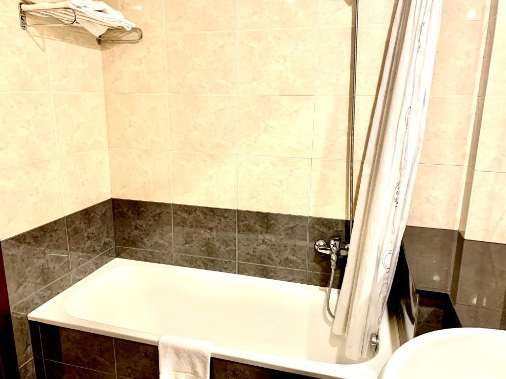 Koupelna v ubytování Hotel Arumí