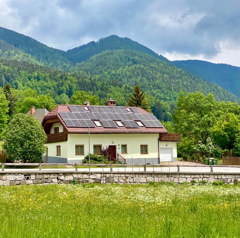 a house with solar panels on the roof at House Planica in Kranjska Gora