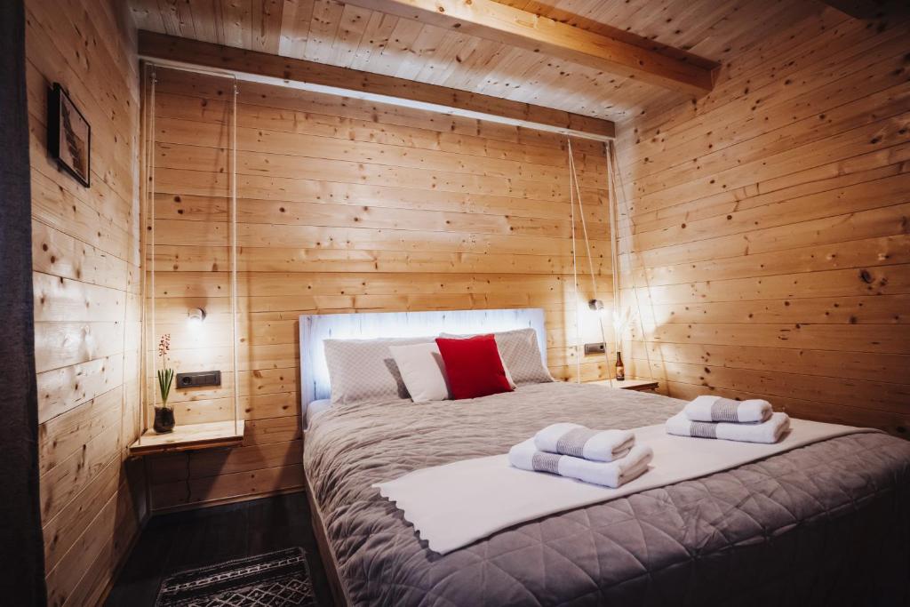 Posteľ alebo postele v izbe v ubytovaní Holiday Home Nightswim Inn