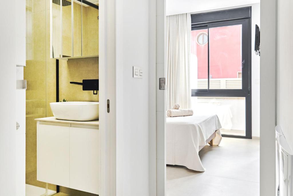 Postel nebo postele na pokoji v ubytování Apartment Tropical Beach