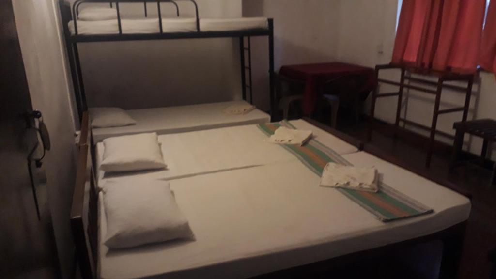 Postel nebo postele na pokoji v ubytování Drop Hostel