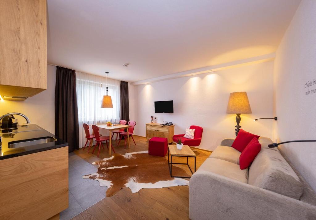 TV a/nebo společenská místnost v ubytování Hapimag Ferienwohnungen Zell am See