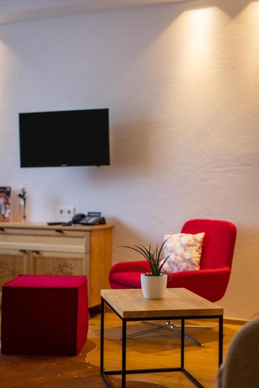 TV a/nebo společenská místnost v ubytování Hapimag Ferienwohnungen Zell am See