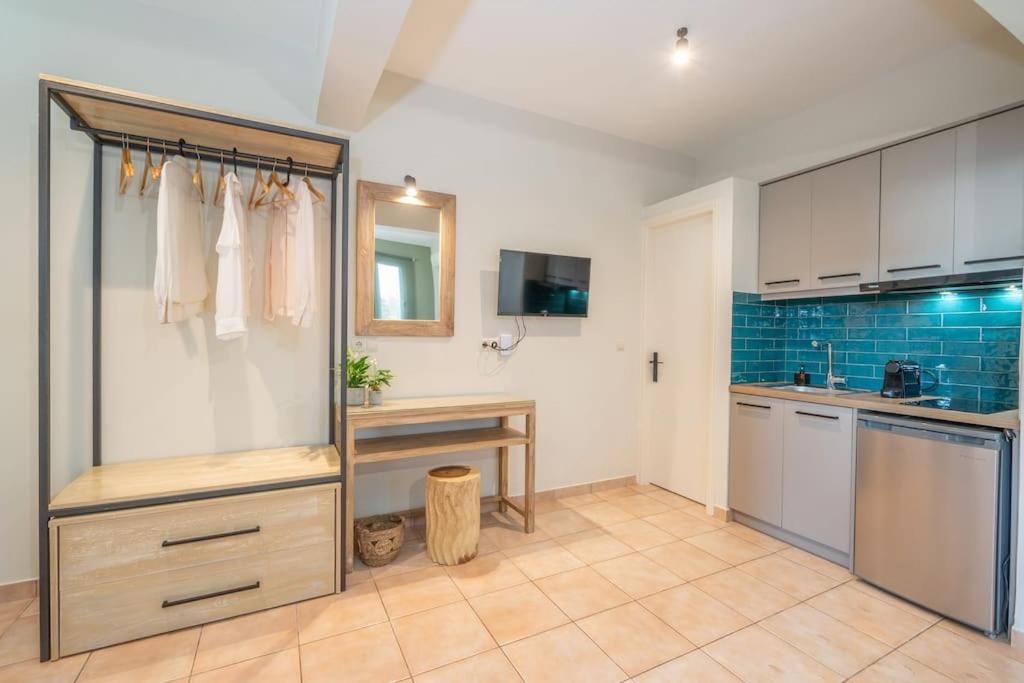Kuchyň nebo kuchyňský kout v ubytování Seashell Luxury Residence - Studio 1
