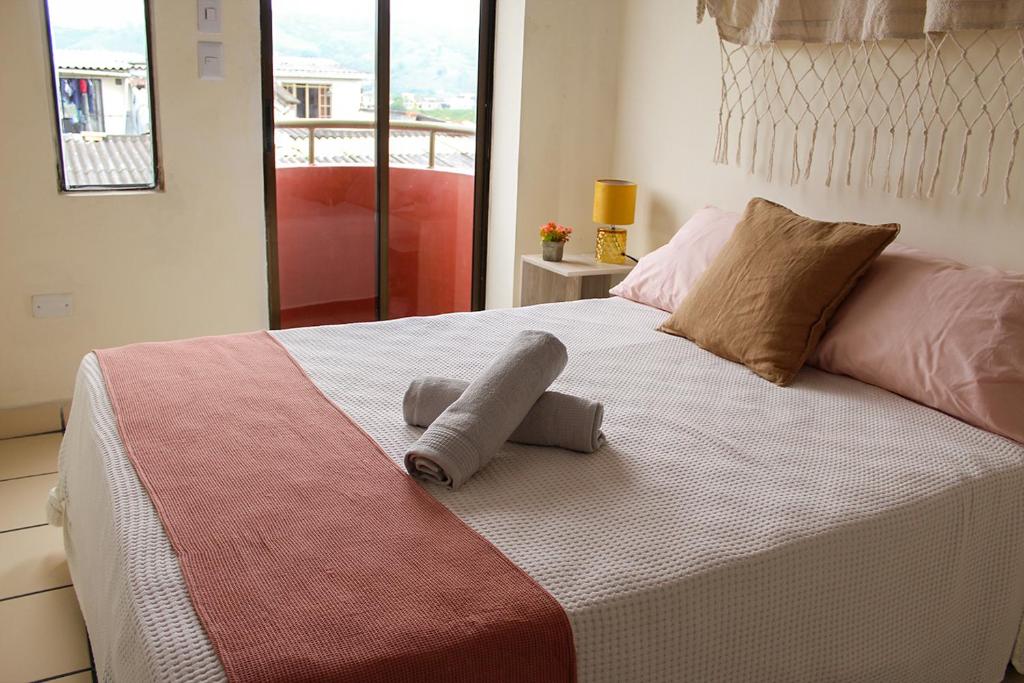 Cama o camas de una habitación en Hospedaje El Saga
