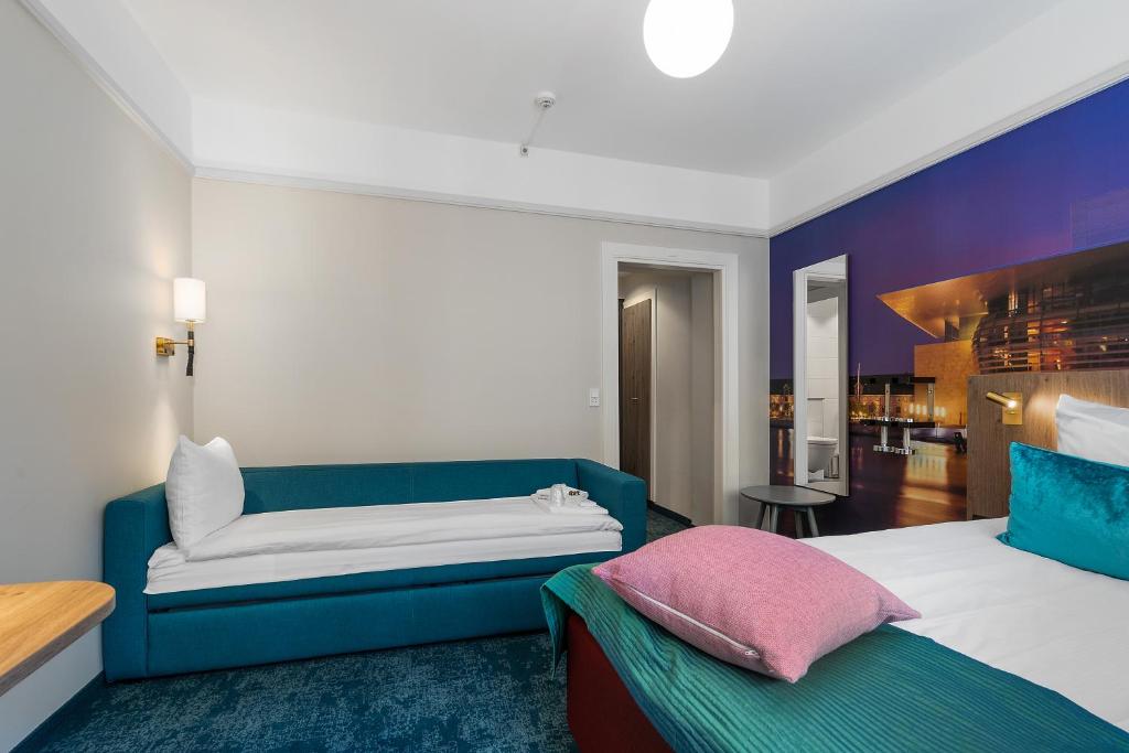 Postel nebo postele na pokoji v ubytování ProfilHotels Richmond