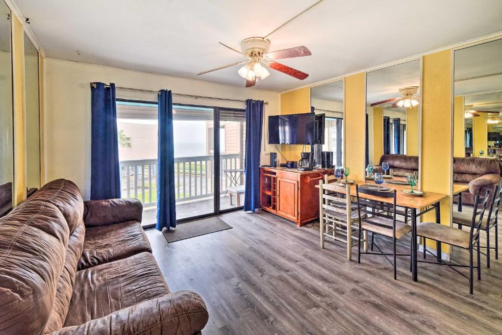 a living room with a couch and a table at Seaside Corpus Christi Condo at The Villa del Sol! in Corpus Christi